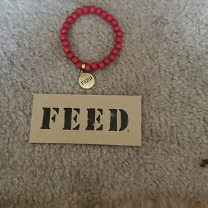 Beaded red stretch bracelet feed
